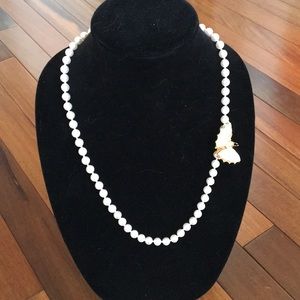 Stunning pink pearl necklace with butterfly